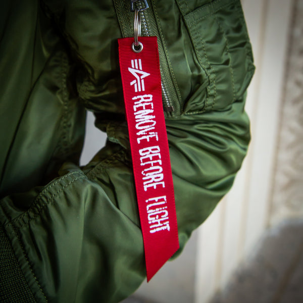 Alpha industries remove before flight tag on sale