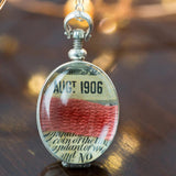 Red Tape Oval Pendant